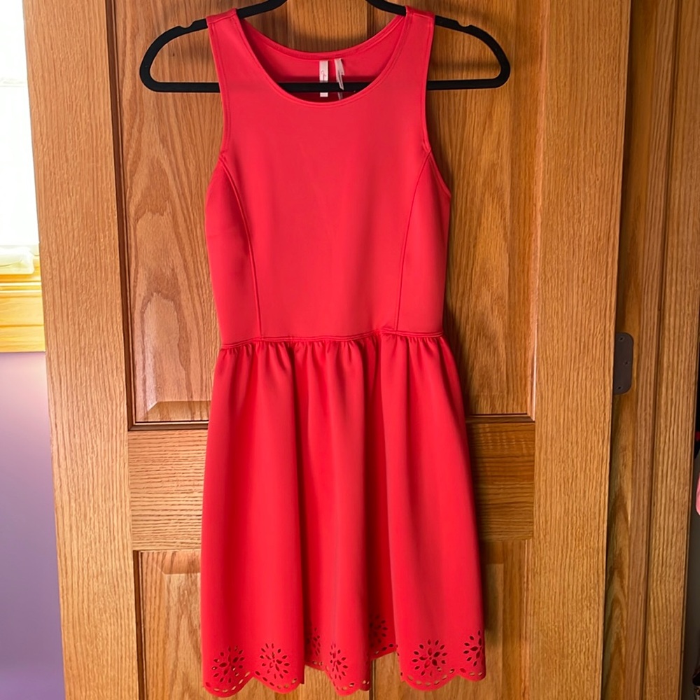 Pink dress with floral cutouts